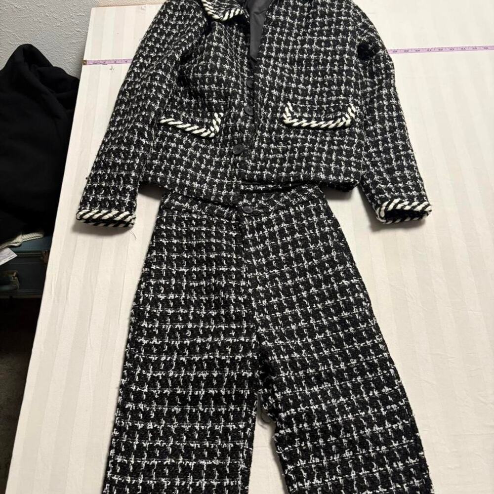 Black and white tweed suit